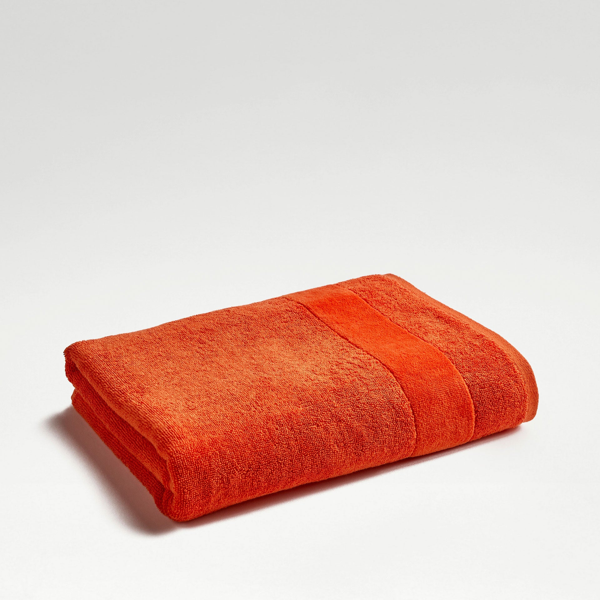 A Turkish cotton bath towel at 550gsm with a subtle woven pattern.