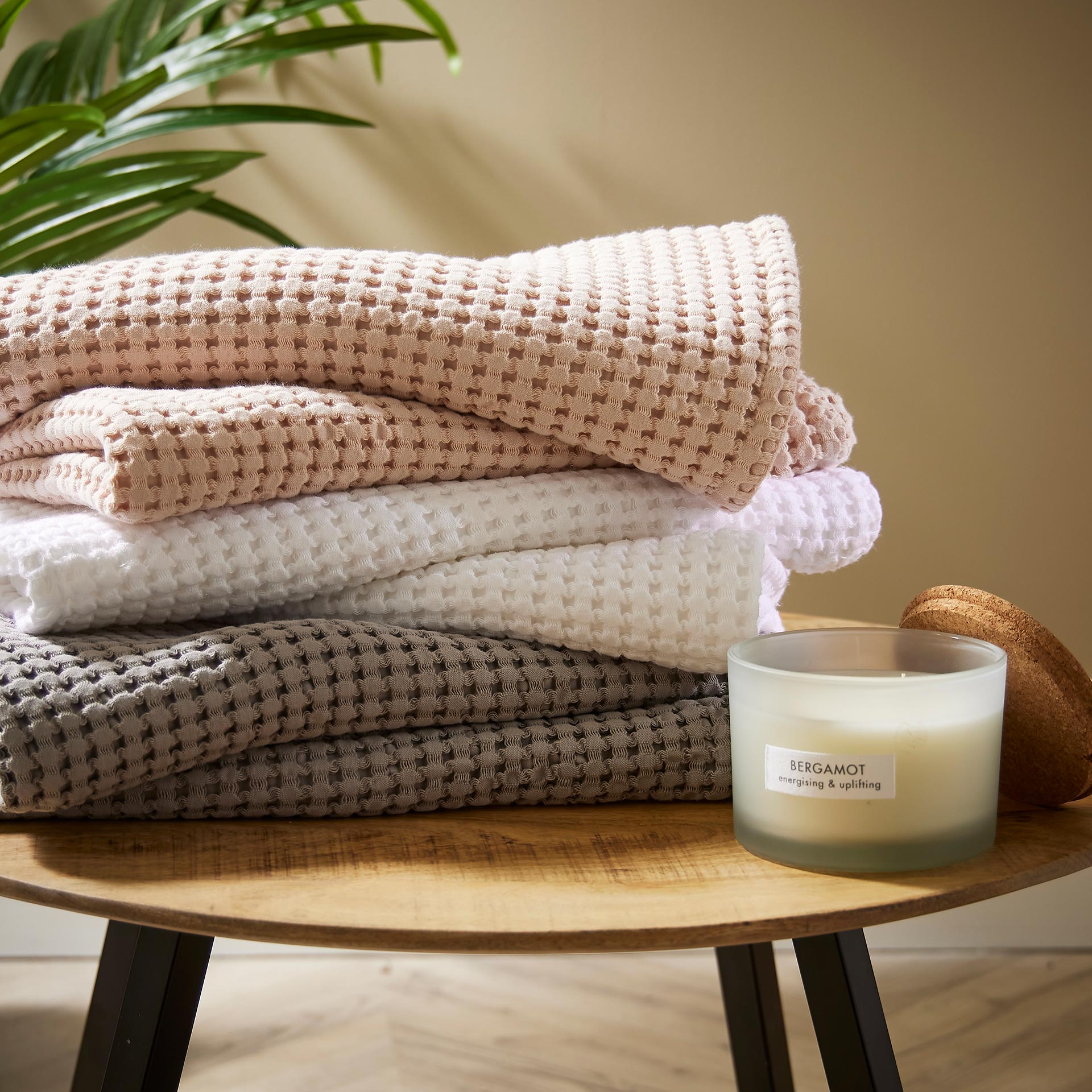 A vibrant selection of Christy waffle towels showcasing texture and color variety
